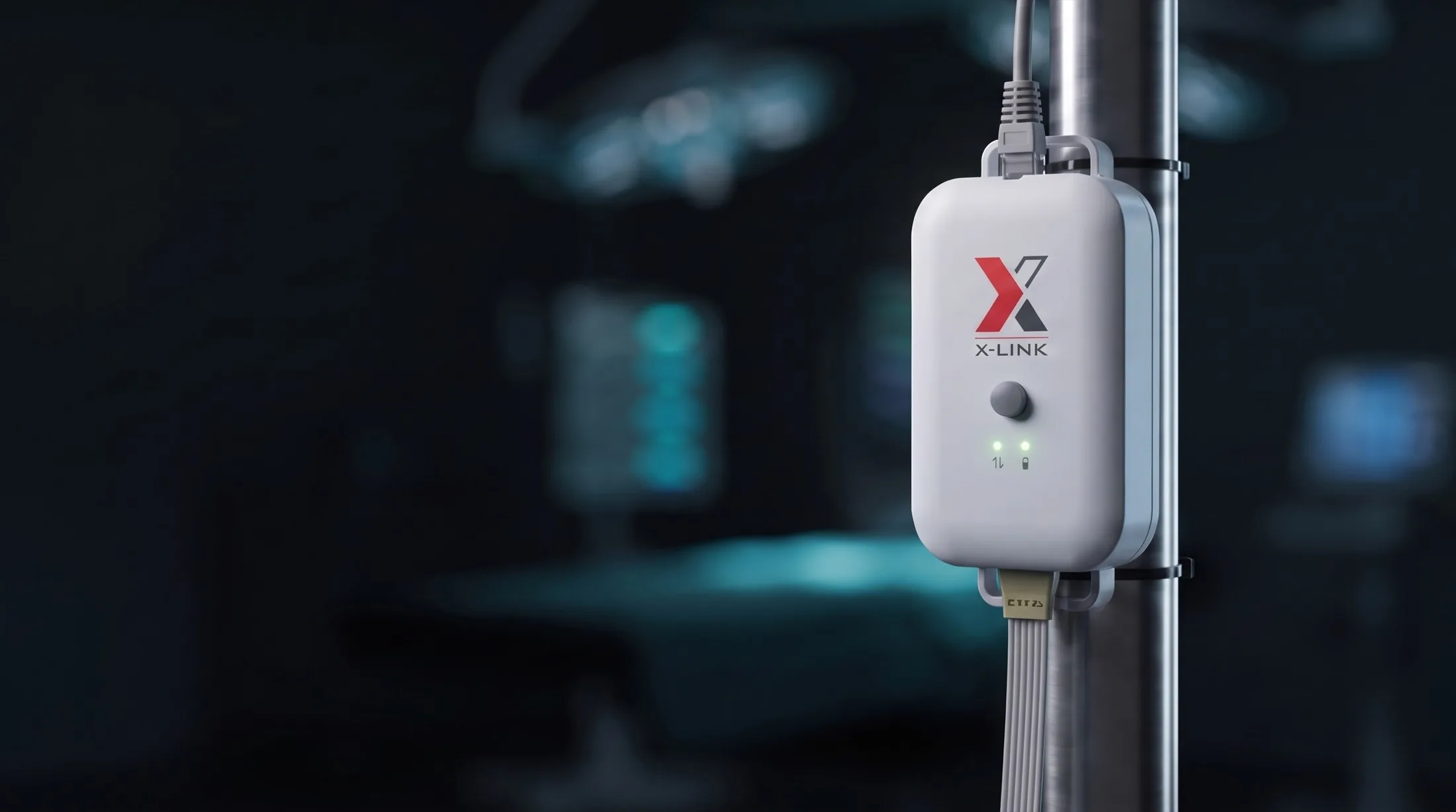 X-Link mounted on an IV pole in a darkened operating room, both status LEDs lit green